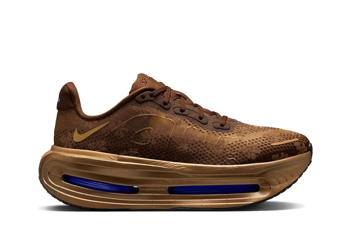 Nike Vomero Premium Flat Stout Brown trainers featuring an earthy brown colourway and a bold running-inspired silhouette